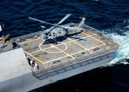 US Navy 090928-N-7241L-187 The littoral combat ship USS Freedom (LCS 1) conducts flight deck certification with an MH-60S Sea Hawk helicopter assigned to the Sea Knights of Helicopter Sea Combat Squadron (HSC) 22