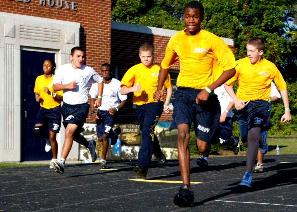 US Navy 091003-N-5366K-068 Navy Junior ROTC members begin a 1.5-mile run during a Navy SEAL Fitness Challenge held at Grimsley High School. Naval Special Warfare (NSW) operators hosted the event