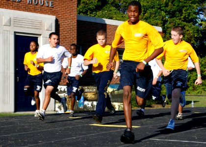 US Navy 091003-N-5366K-068 Navy Junior ROTC members begin a 1.5-mile run during a Navy SEAL Fitness Challenge held at Grimsley High School. Naval Special Warfare (NSW) operators hosted the event
