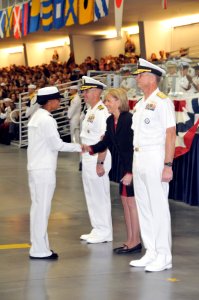 US Navy 091002-N-8848T-276 Patricia Adams, center, Deputy Assistant Secretary of the Navy for Civilian Human Resources, congratulates Seaman Recruit Alonna Randolph, from Santee, Calif