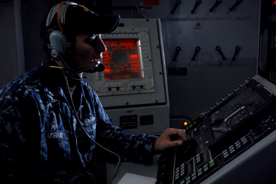 US Navy 091005-N-1688B-011 Gunner's Mate 2nd Class Drew Murray, from Titan, Texas, keeps watch at the magazine station for the 5-inch MK-41 gun aboard the guided missile destroyer USS Cole (DDG 67)