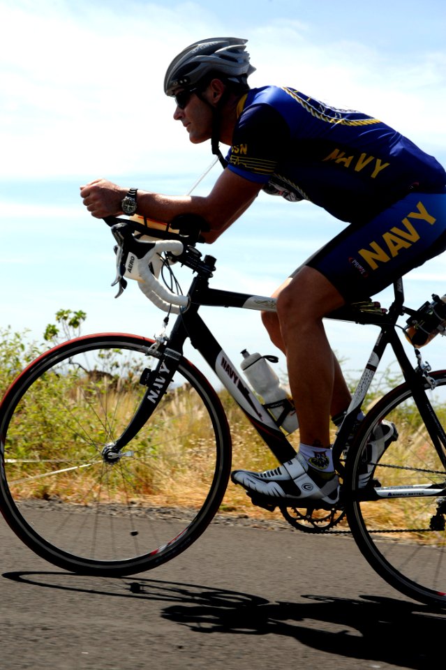 US Navy 091006-N-0555B-422 Lt. Cmdr. Don Cross trains on the Kuakini Highway for the 2009 Ford Ironman World Championship triathlon in Kailua-Kona,