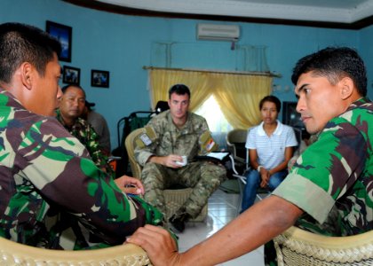 US Navy 091007-N-9950J-064 U.S. Air Force Maj. John Traxler, ground force commander for the 353rd Special Operations Group, meets with Indonesian army officers at Ta Bing Air Field