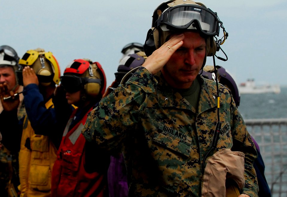 US Navy 091007-N-0807W-215 Brig. Gen. Mark A. Brilakis, commanding general of the 3rd Marine Expeditionary Brigade, is piped aboard the amphibious dock landing ship USS Harpers Ferry (LSD 49)