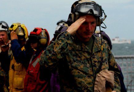 US Navy 091007-N-0807W-215 Brig. Gen. Mark A. Brilakis, commanding general of the 3rd Marine Expeditionary Brigade, is piped aboard the amphibious dock landing ship USS Harpers Ferry (LSD 49)