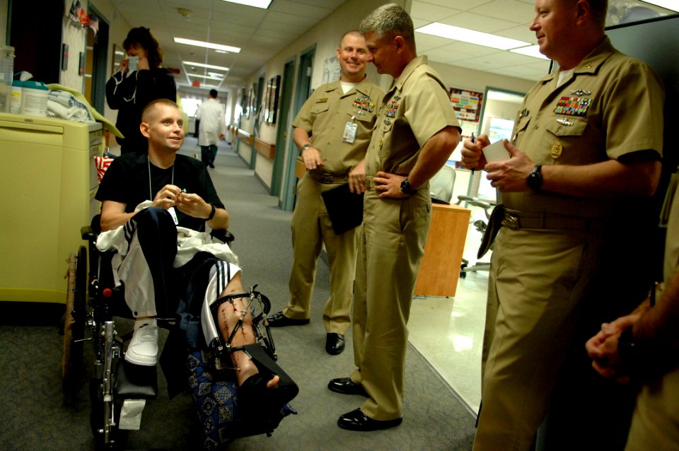 US Navy 091006-N-9818V-027 Master Chief Petty Officer of the Navy (MCPON) Rick West visits with wounded service members during a visit to National Naval Medical Center, Bethesda