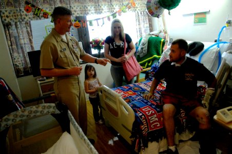 US Navy 091006-N-9818V-157 Master Chief Petty Officer of the Navy (MCPON) Rick West meets with U.S. Marine Lance Cpl. Patrick Semeraro