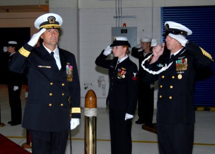 US Navy 091008-N-9860Y-001 Rear Adm. William Moran, commander of Patrol and Reconnaissance Group, is piped through side boys during a change of command ceremony