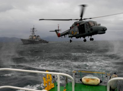 US Navy 091008-N-1688B-200 A Brazilian navy AH-11A Super Lynx Mk-21A helicopter prepares to drop a boarding team by fast rope during a visit, board, search and seizure (VBSS) exercise