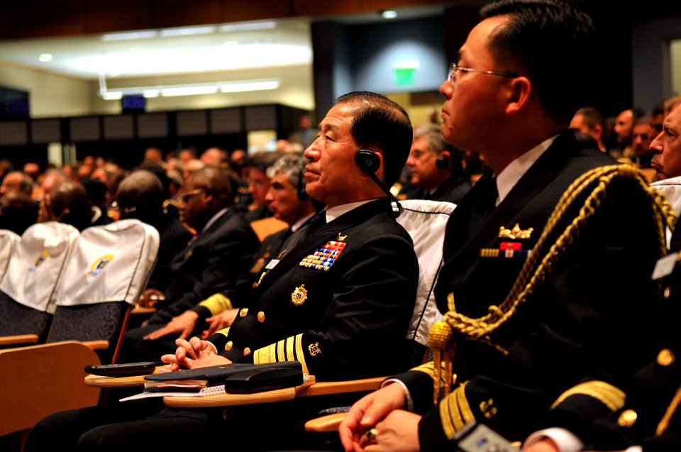 US Navy 091007-N-8273J-080 Adm. Jung, Ok-Keun, Republic of Korea Navy, Chief of Naval Operations, middle, listens via an interpreter to the opening remarks delivered by Chief of Naval Operations (CNO) Adm. Gary Roughead
