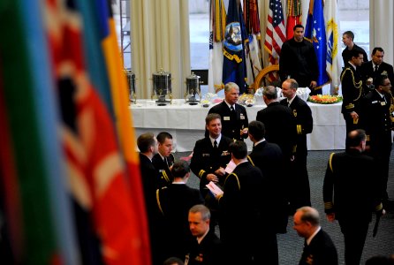 US Navy 091007-N-8273J-011 Chief of Naval Operations (CNO) Adm. Gary Roughead, upper left, speaks with attendees during the 19th Biennial International Sea Power Symposium in Newport, R.I photo