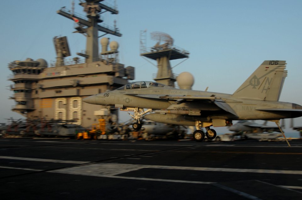 US Navy 091010-N-3038W-564 An F-A-18F Super Hornet, assigned to the Black Aces of Strike Fighter Squadron (VFA) 41, lands on the flight deck of the aircraft carrier USS Nimitz (CVN 68)