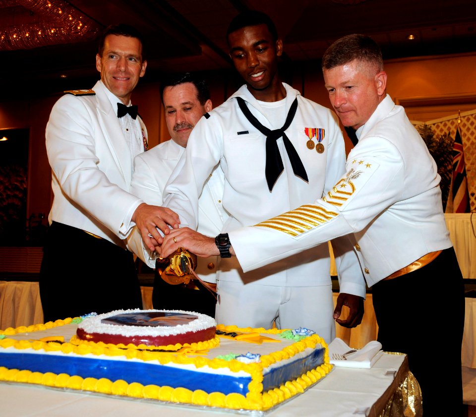 US Navy 091010-N-7498L-042 Rear Adm. Dixon R. Smith, left, commander of Navy Region Hawaii and commander of Naval Surface Group Middle Pacific, Command Master Chief William Coy Holz,
