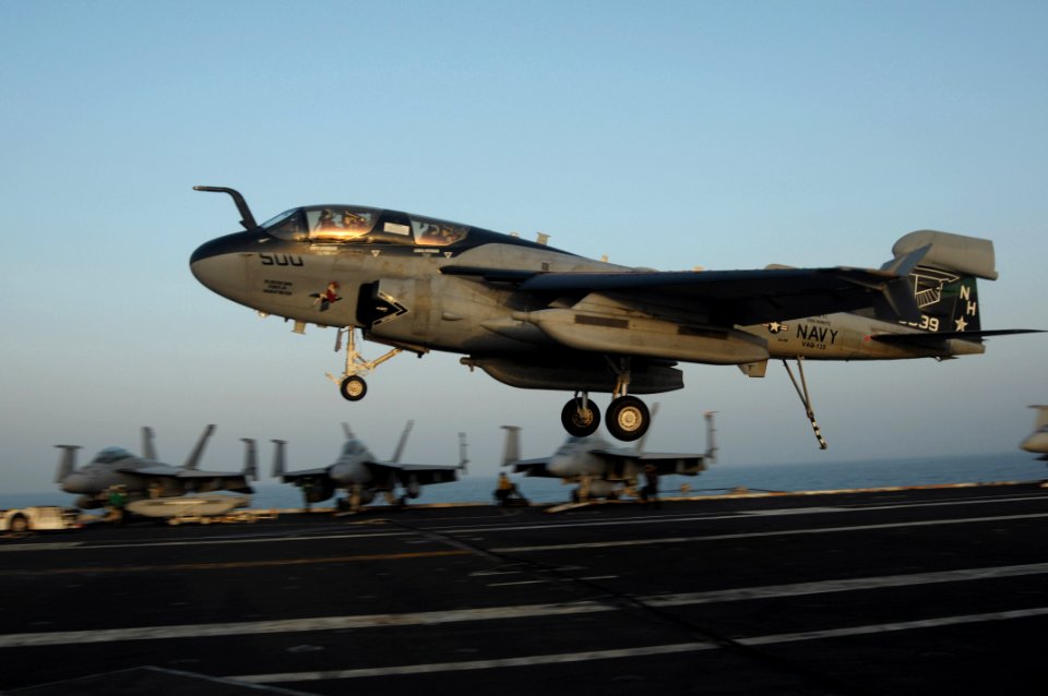 US Navy 091010-N-3038W-626 An EA-6B Prowler, assigned to the Black Ravens of Tactical Electronic Attack Squadron (VAQ) 135, lands on the flight deck aboard the aircraft carrier USS Nimitz (CVN 68)
