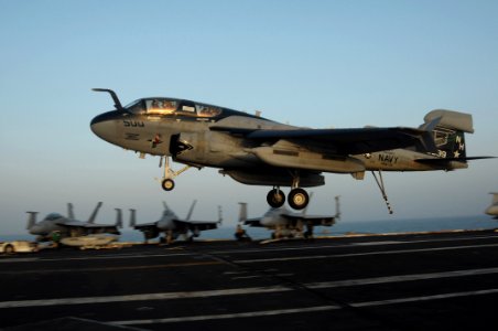 US Navy 091010-N-3038W-626 An EA-6B Prowler, assigned to the Black Ravens of Tactical Electronic Attack Squadron (VAQ) 135, lands on the flight deck aboard the aircraft carrier USS Nimitz (CVN 68) photo