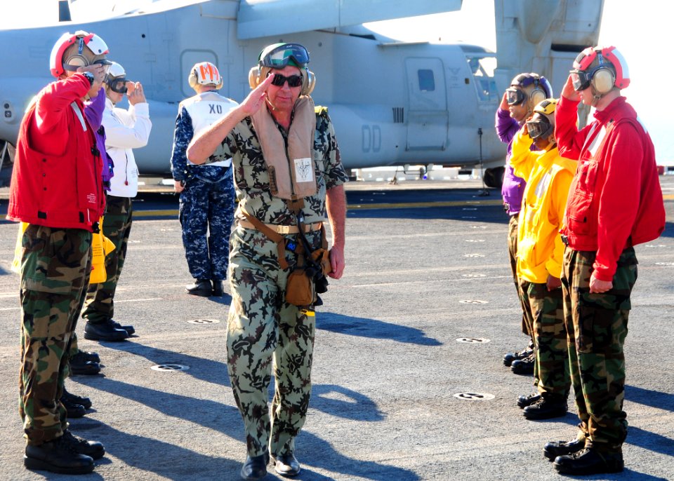 US Navy 091011-N-3165S-039 Egyptian armed forces general officer salutes side boys from the multi-purpose amphibious assault ship USS Bataan (LHD 5)