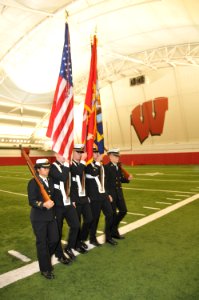 US Navy 091010-N-8848T-597 The Iowa State University Navy ROTC midshipmen color guard performs a facing movement during a competition in the McClain Indoor Practice Facility at the University of Wisconsin-Madison
