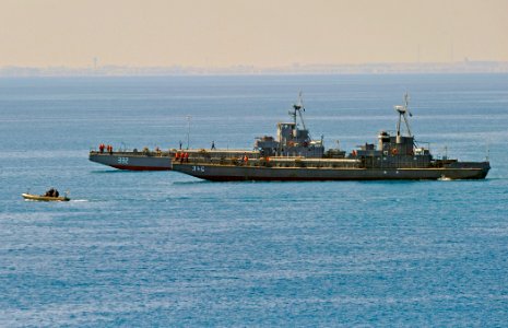 US Navy 091012-N-5345W-152 A rigid-hull inflatable boat from the amphibious dock landing ship USS Fort McHenry (LSD 43) and two Egyptian navy amphibious landing craft make their way to shore