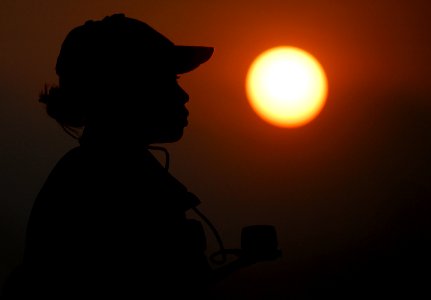 US Navy 091012-N-0807W-045 Seaman Charlotte B. Pounds, from Atlanta, stands a watch as aft lookout sound powered phone talker during sea and anchor detail aboard the amphibious dock landing ship USS Harpers Ferry (LSD 49)