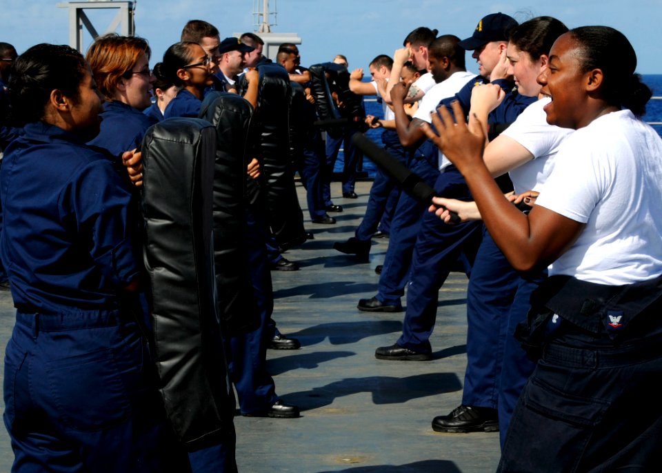 US Navy 091012-N-7478G-211 Sailors participate in a reactionary force non-lethal weapons class aboard the amphibious command ship USS Blue Ridge (LCC 19)