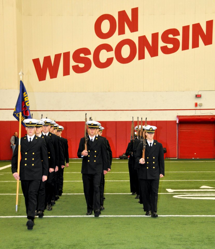 US Navy 091010-N-8848T-679 University of Wisconsin Navy ROTC midshipmen perform a maneuver during the platoon drill competition inside the McClain Indoor Practice Facility at the University of Wisconsin-Madison