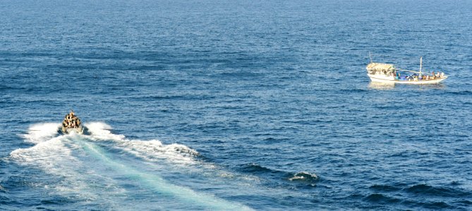 US Navy 091014-N-9500T-020 A visit, board, search and seizure (VBSS) team from the guided-missile cruiser USS Anzio (CG 68) approaches a suspicious dhow