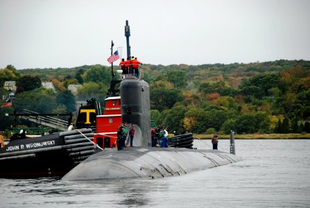 US Navy 091015-N-3090M-450 The attack submarine USS Virginia (SSN 774) departs Naval Submarine Base New London to begin her first scheduled full-length deployment photo