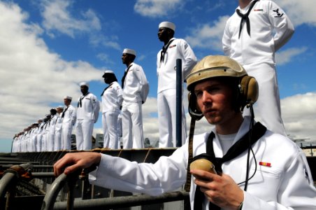 US Navy 091013-N-3610L-325 A Sailor assigned to the aircraft carrier USS Ronald Reagan (CVN 76) stands a phone-talker watch