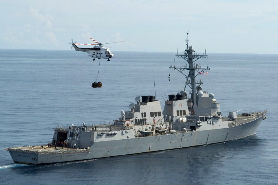 US Navy 091013-N-9123L-187 An AS332 Super Puma helicopter assigned to the Military Sealift Command dry cargo ship USNS Richard E. Byrd (T-AKE 4) departs the guided-missile destroyer USS McCampbell (DDG 85)