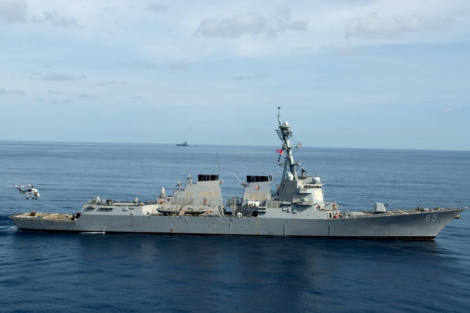 US Navy 091013-N-9123L-181 The guided-missile destroyer USS McCampbell (DDG 85) conducts a vertical replenishment with an AS332 Super Puma helicopter