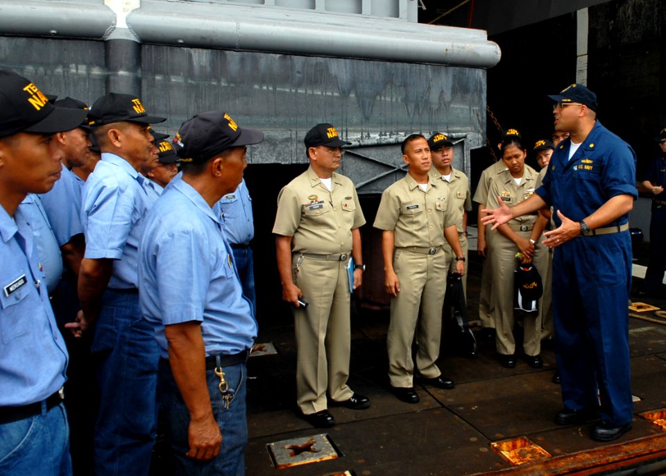 US Navy 091014-N-6692A-025 Lt. Cmdr. Adrian Ragland, executive officer of the amphibious dock landing ship USS Tortuga (LSD 46),