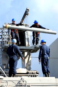 US Navy 091016-N-0890S-008 Sailors load a RIM-116 Rolling Airframe Missile (RAM) into the missile launcher aboard the multi-purpose amphibious assault ship USS Wasp (LHD 1)
