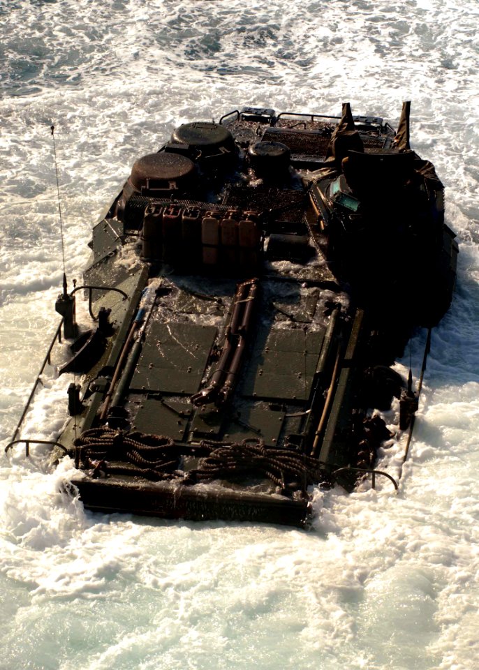 US Navy 091017-N-5148B-028 An amphibious assault vehicle assigned to the 11th Marine Expeditionary Unit (11th MEU) debarks the well deck of the dock landing ship USS Rushmore (LSD 47)