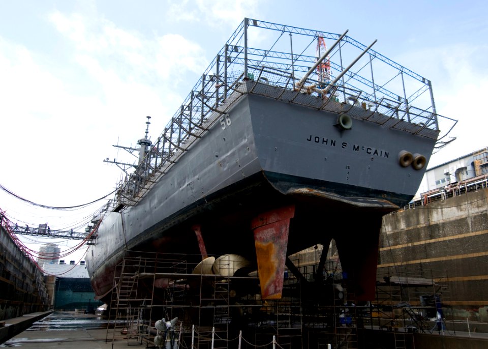 US Navy 091019-N-2638R-001 The guided-missile destroyer USS John S. McCain (DDG 56) is in dry dock at Fleet Activities Yokosuka during a scheduled dry-dock selective restricted availability