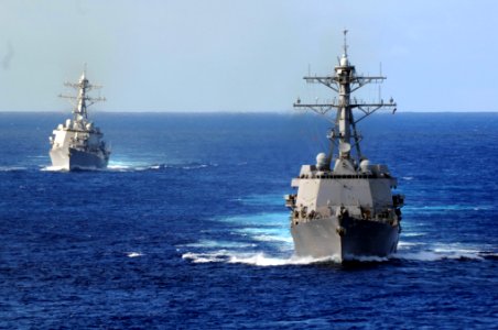 US Navy 091016-N-9132C-084 The guided-missile destroyer USS Gridley (DDG 101), right, and the guided-missile destroyer USS Howard (DDG 83) transit in the Pacific Ocean photo