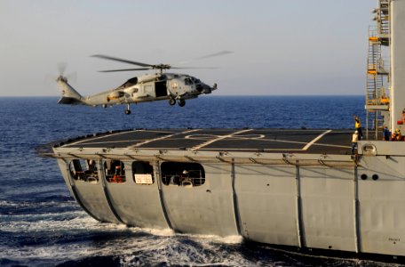 US Navy 091016-N-5345W-027 An SH-60B Sea Hawk helicopter from the Wolfpack of Helicopter Anti-Submarine Squadron Light (HSL) 45 lifts off from the flight deck of the Military Sealift Command fleet replenishment oiler USNS Kanaw