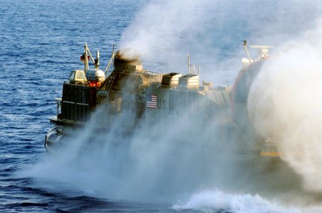 US Navy 091015-N-5345W-166 A landing craft, air cushion assigned to Assault Craft Unit (ACU 4) comes to full power while exiting the well deck of the amphibious dock landing ship USS Fort McHenry (LSD 43)