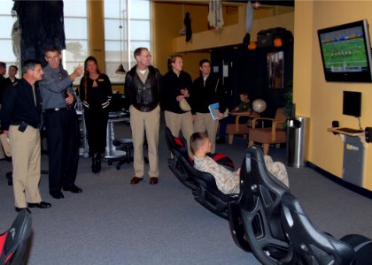 US Navy 091015-N-9860Y-005 Russell Gale, Naval Air Station Whidbey Island recreation director, gives Vice Adm. Michael Vitale a tour of the Liberty Northwest Center at NAS Whidbey Island
