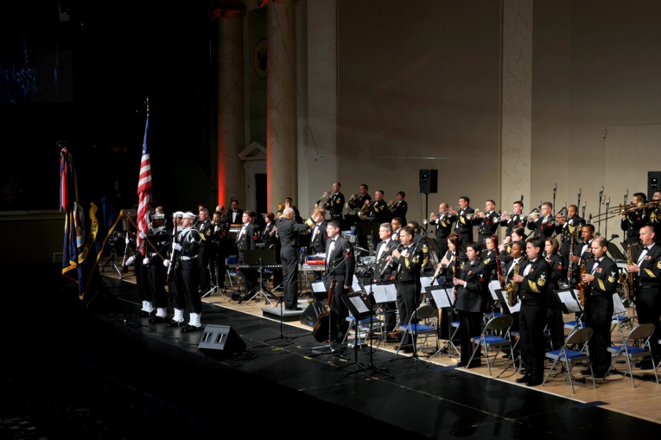 US Navy 091017-N-0773H-020 Capt. George N. Thompson, commanding officer and leader of the United States Navy Band, conducts the band as colors are presented at the beginning of the 234th Navy Birthday Concert at DAR Constitutio