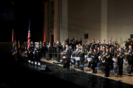 US Navy 091017-N-0773H-020 Capt. George N. Thompson, commanding officer and leader of the United States Navy Band, conducts the band as colors are presented at the beginning of the 234th Navy Birthday Concert at DAR Constitutio
