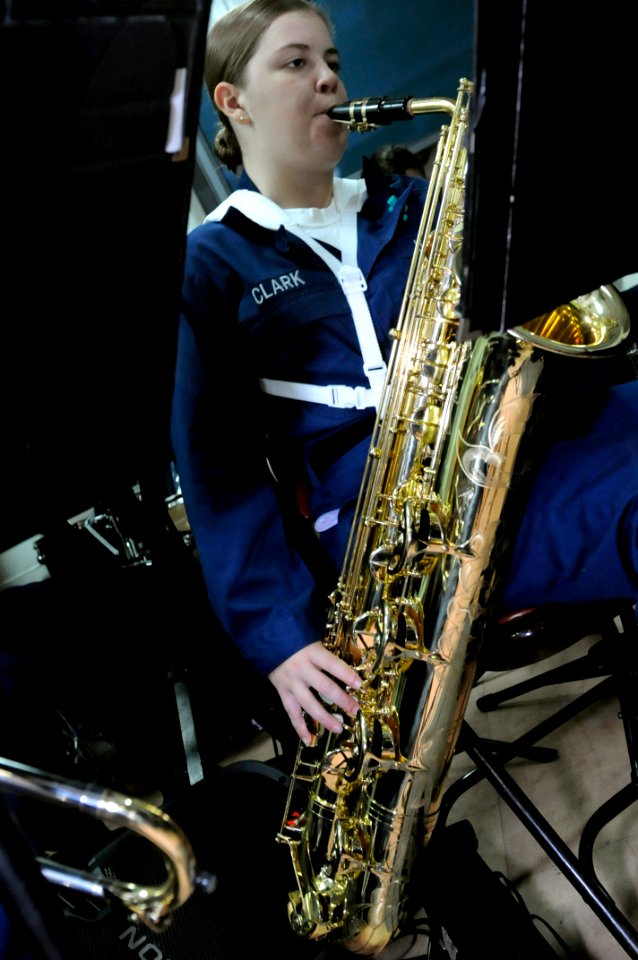 US Navy 091017-N-7478G-191 Musician Seaman Danielle Clark, assigned to the U.S. 7th Fleet band, plays baritone saxophone during practice aboard the amphibious command ship USS Blue Ridge (LCC 19)