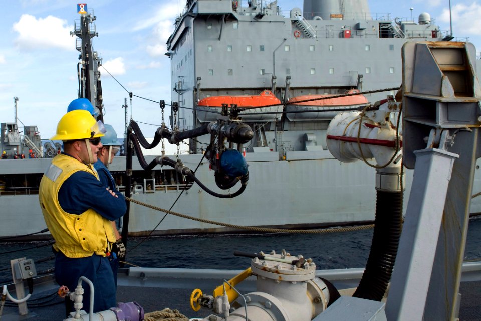 US Navy 091017-N-9123L-032 Boatswain's Mate 1st Class Dennis Winters, from Rosharon, Texas, calls instructions aboard the guided-missile destroyer USS McCampbell (DDG 85)