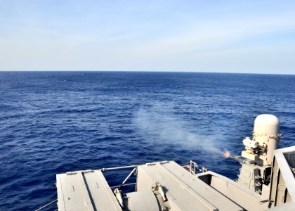 US Navy 091020-N-2013O-110 The Phalanx Close-in Weapons System (CIWS) aboard the aircraft carrier USS George Washington (CVN 73) is fired at a towed target during a live-fire exercise