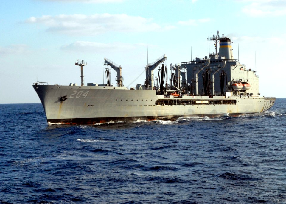 US Navy 091018-N-1644H-006 The Military Sealift Command fleet replenishment oiler USNS Rappahannock (T-AO 204) transits alongside the aircraft carrier USS George Washington (CVN 73) after a replenishment at sea