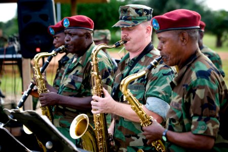 US Navy 091018-O-XXXXV-093 Musician 2nd Class Jason Stark, a member of the Commander, U.S. Naval Forces Europe rock band, Flagship, performs with members of the Armed Forces of Liberia band