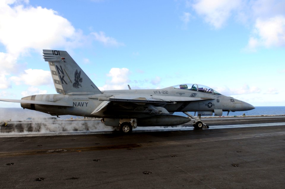 US Navy 091019-N-9132C-331 Brig. Gen. Steve Ritchie sits in the rear seat of the cockpit of an F-A-18F Super Hornet assigned to the Fighting Redcocks of Strike Fighter Squadron (VFA) 22, as it launches from the aircraft carrier