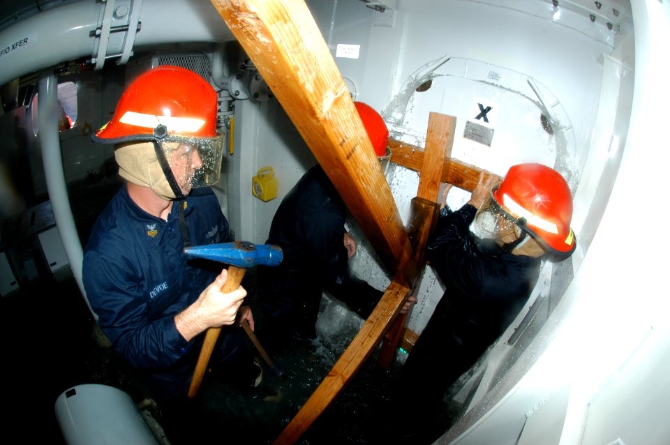US Navy 091020-N-7498L-053 Sailors secure the K-type shoring during damage control training at the Center of Naval Engineering Learning Site Pearl Harbor