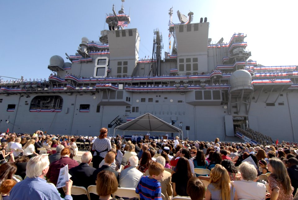 US Navy 091024-N-8788B-348 Thousands of friends, family and official guests watch as Sailors and Marines man the rails during the commissioning of the amphibious assault ship USS Makin Island (LHD 8)