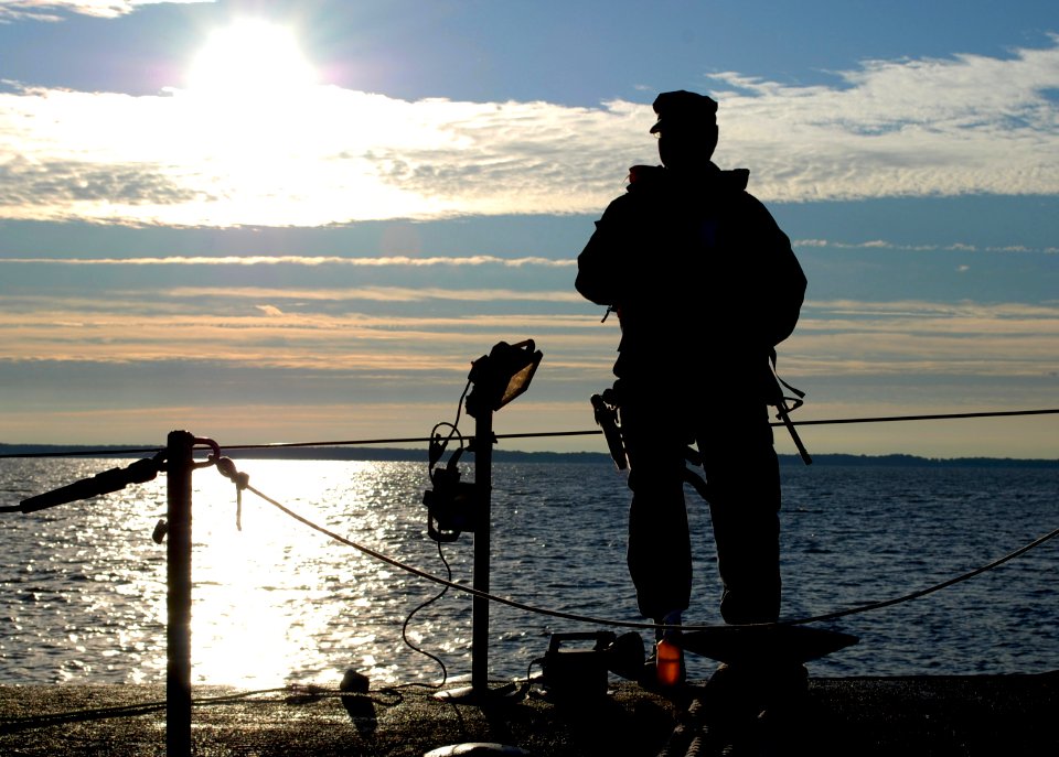 US Navy 091025-N-8750E-049 Sonar Technician (Submarine) 2nd Class Steve Spence, from Houston, Texas, stands sentry aboard the Los Angeles-class attack submarine USS Annapolis (SSN 760)