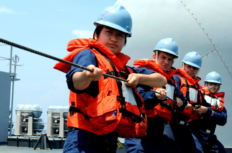 US Navy 091023-N-7478G-358 Line handlers aboard the amphibious command ship USS Blue Ridge (LCC 19) hold the phone and distance line connected to the Military Sealift Command fleet replenishment oiler USNS Walter S. Diehl (T-AO